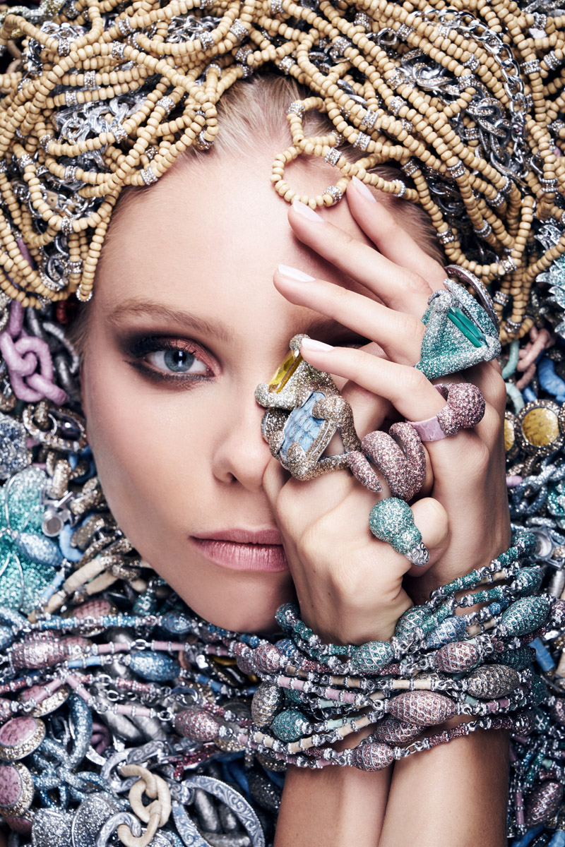Balistarz-model-Aspen-Gerasimov-fashion-headshot-for-KMO-brand-surrounded-by-jewelries