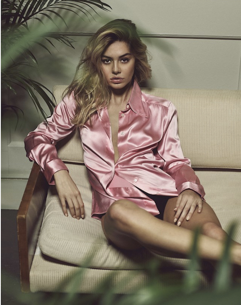 Balistarz-model-Lauren-Sintes-portrait-shoot-in-a-shining-pink-button-up-lazily-sitting