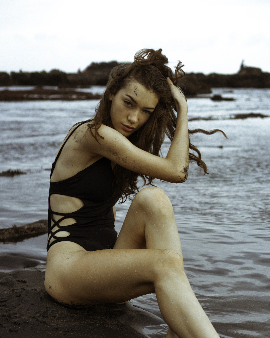 Balistarz-model-Macili-Massine-portrait-beach-shoot-with-wet-sand-and-a-black-swimsuit