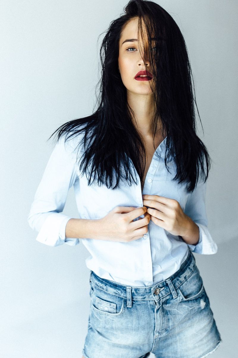 Balistarz-model-Olga-Portnova-portrait-shoot-in-a-blue-button-up-shirt-and-a-blue-shorts