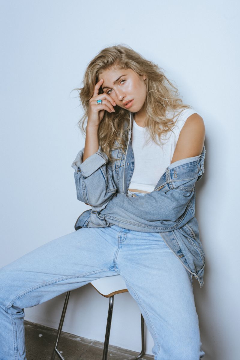 Balistarz-model-Rachel-Bowler-portrait-shoot-in-casual-denim-clothing-relaxing-on-a-chair