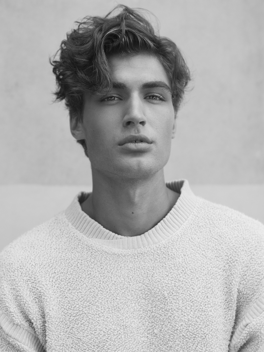 Balistarz-model-Reuben-Mckechnie-black-and-white-filter-white-fur-sweater-profile