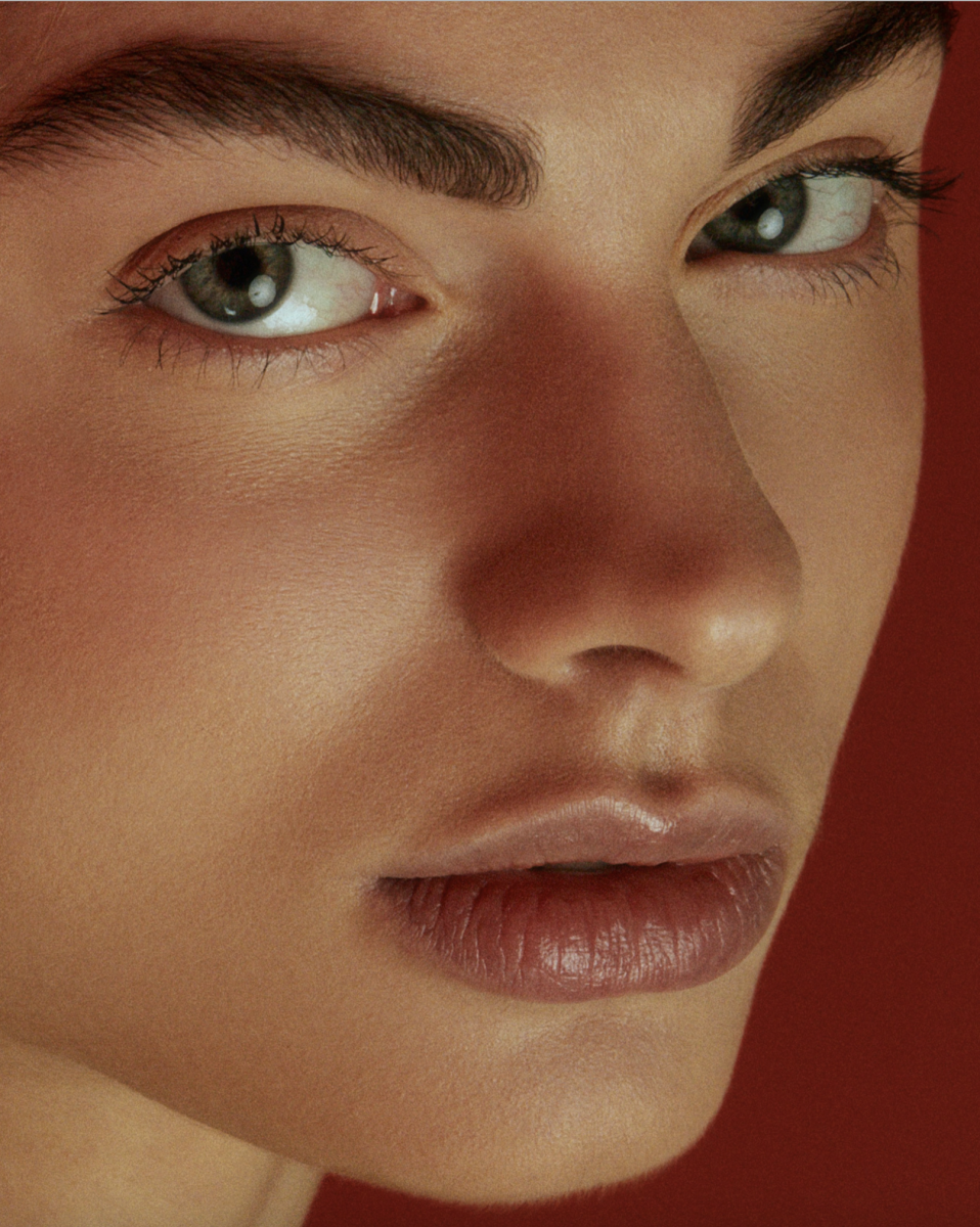 Balistarz-model-Tina-Veshaguri-portrait-side-headshot-with-red-background