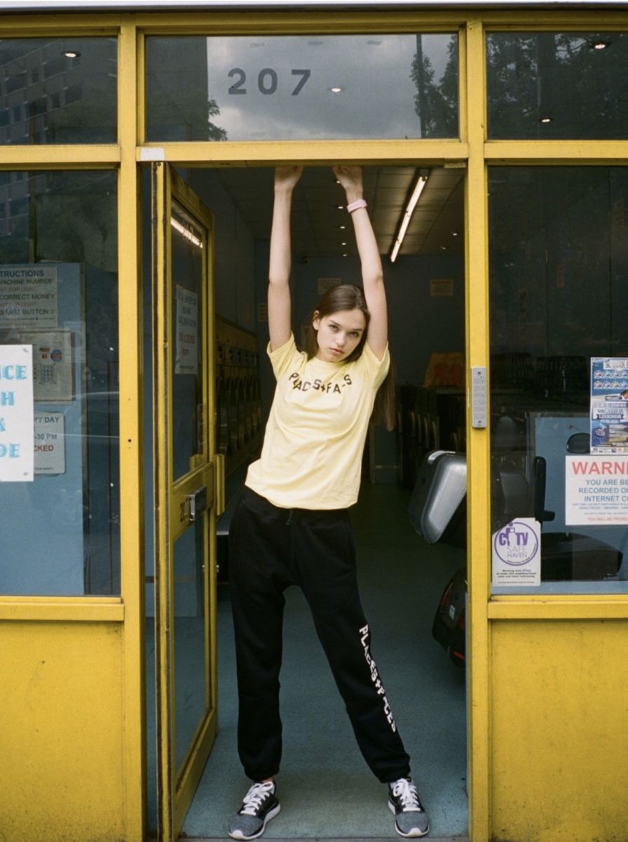 Balistarz-model-Valeria-Rudenko-portrait-shoot-with-black-sweat-pants-and-a-yellow-shirt