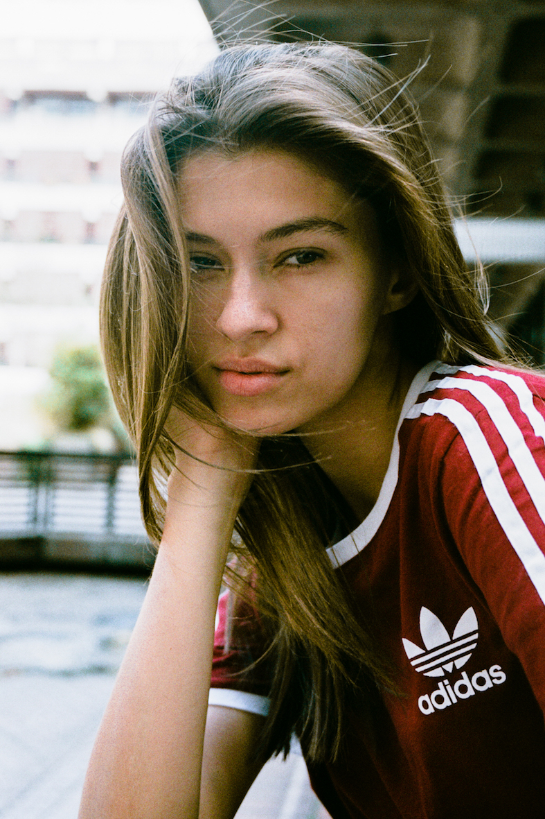 Balistarz-model-Veronika-Istomina-casual-portrait-shot-wearing-red-Adidas-sport-shirt